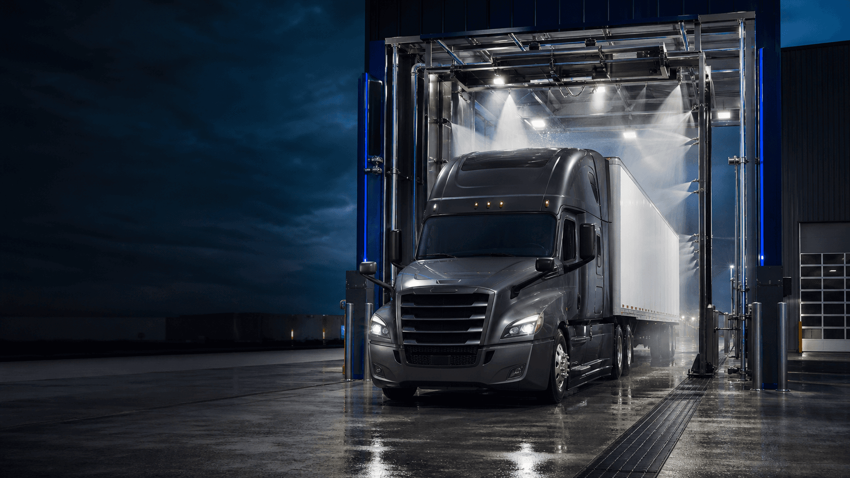 Concept rendering of a tractor-trailer moving through a high-clearance Big Bay Wash bay